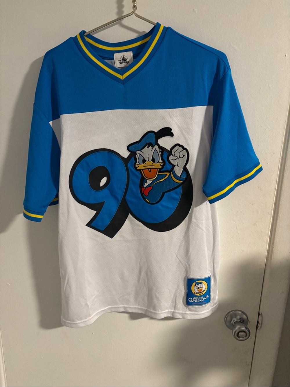 Disney Donald Duck Quacketeer Club 90 Jersey Shirt Blue White Size Small
1260)
